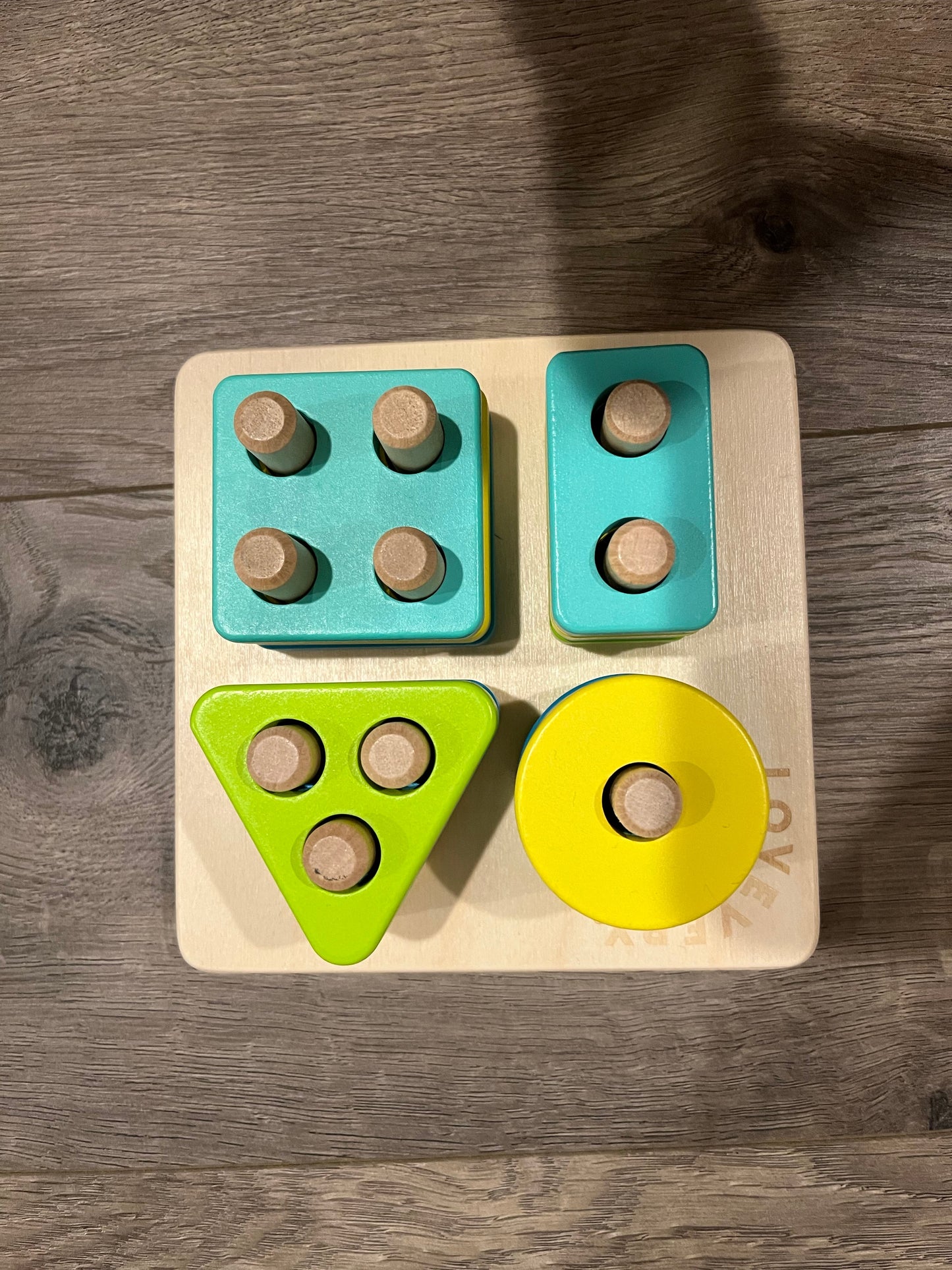 Seller #66,. Lovevery Sort and Stack Peg Puzzle