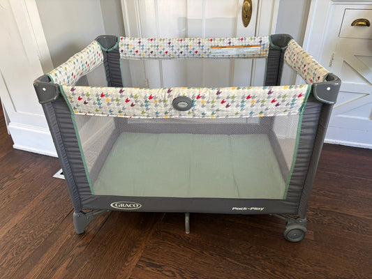 #101 *REDUCED* Graco On the Go Pack N Play and Sheets White Green