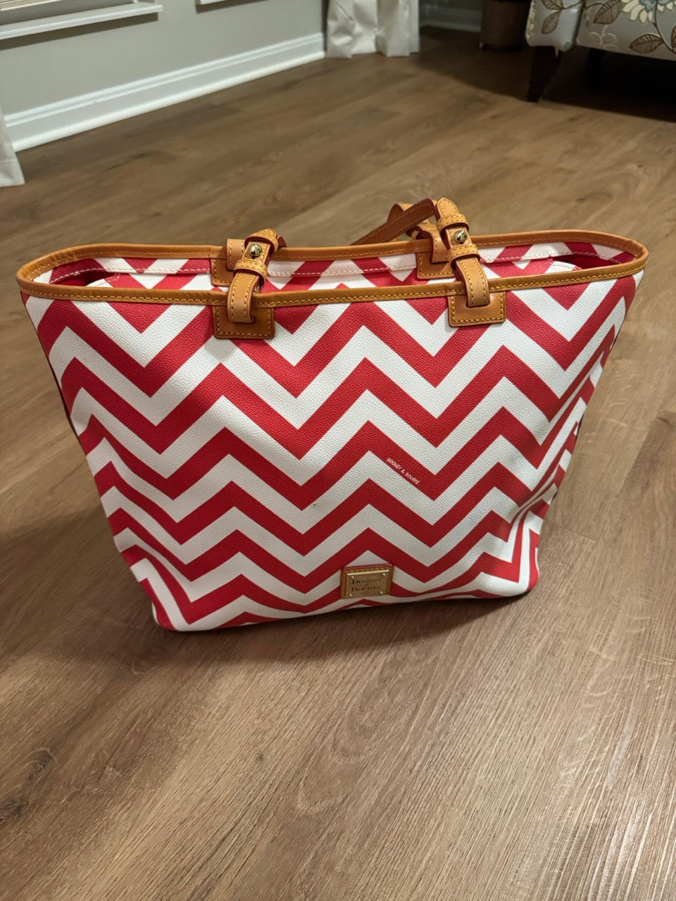 Seller #114 Dooney and Bourke leather orange and white chevron tote