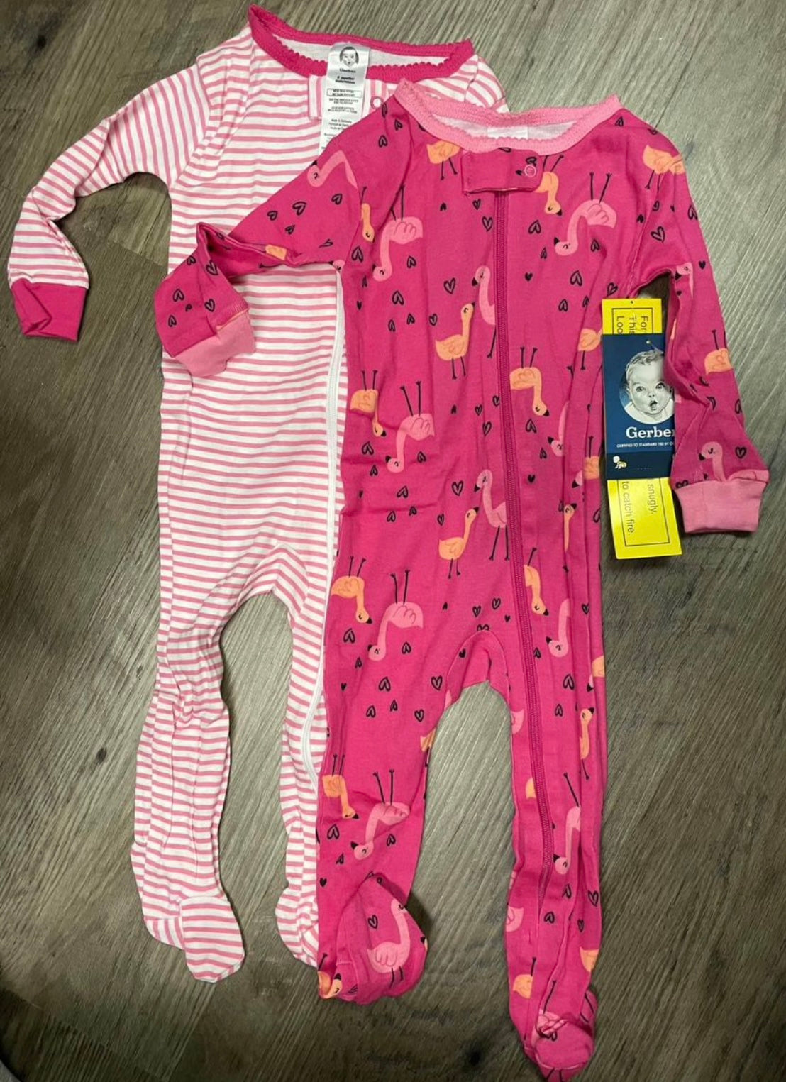 #13 New baby girl 6 months. Gerber onesies. Long sleeves. Comes with two.