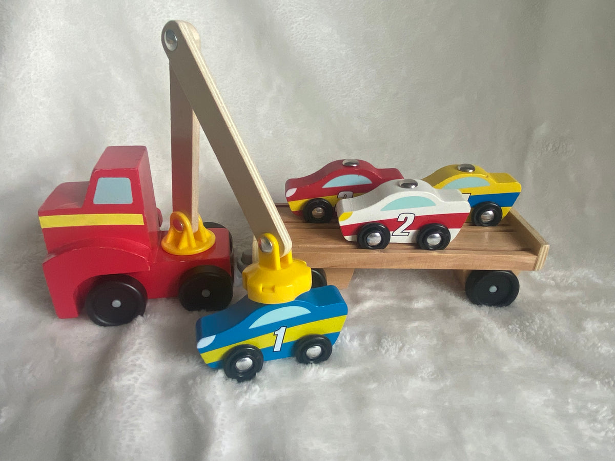 Seller 59 Melissa and Doug magnetic race car/car transporter