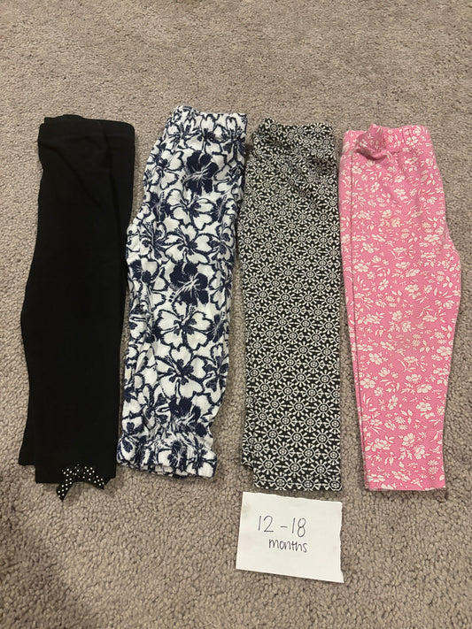 #138 - 12-18 Mo - VGUC 4 Pair Pants (black, navy/white, black/white, pink floral) - PU 45236