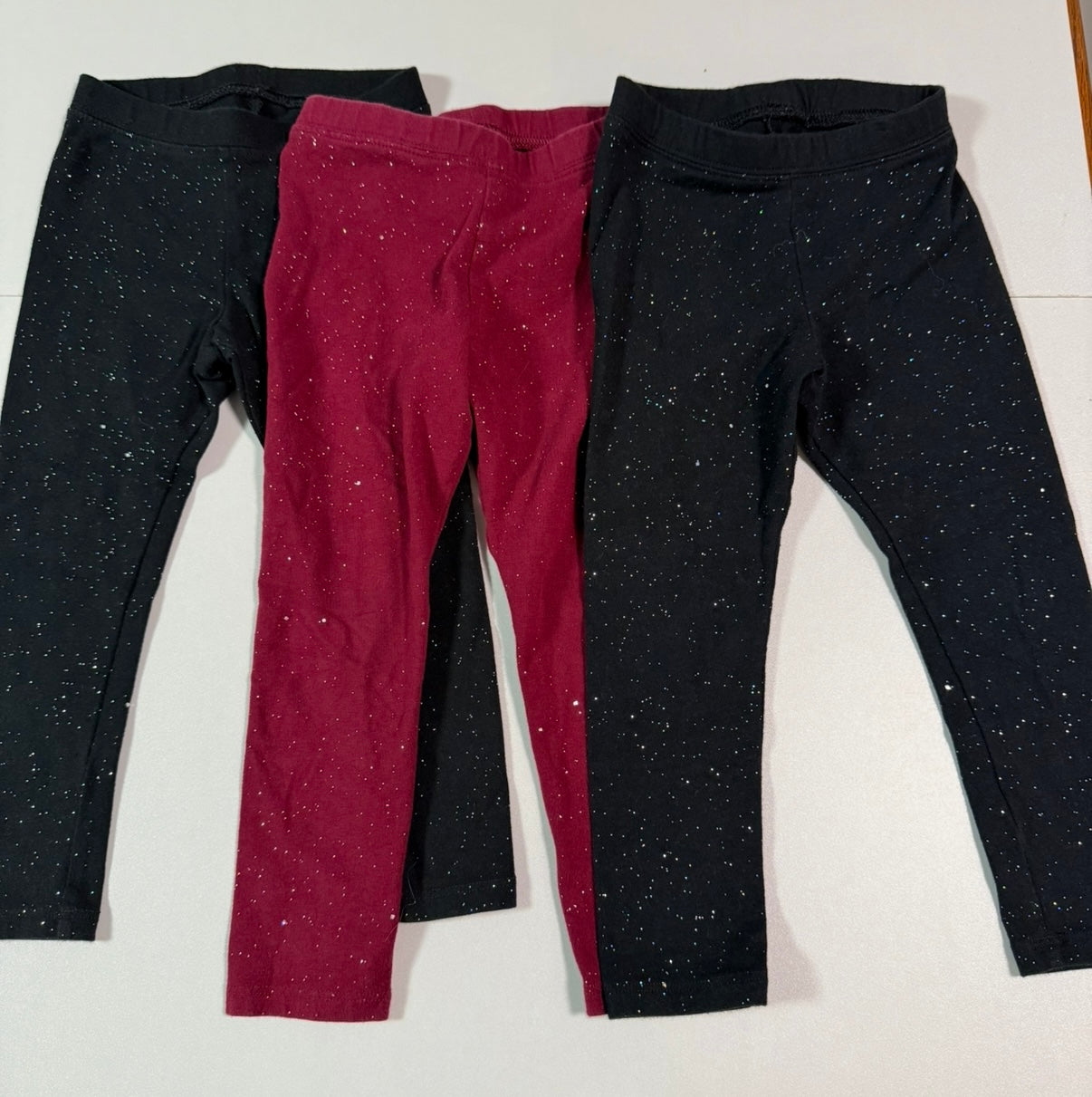 #155 3 piece Cat and Jack sparkle leggings (2 black, 1 maroon), girls size 3T