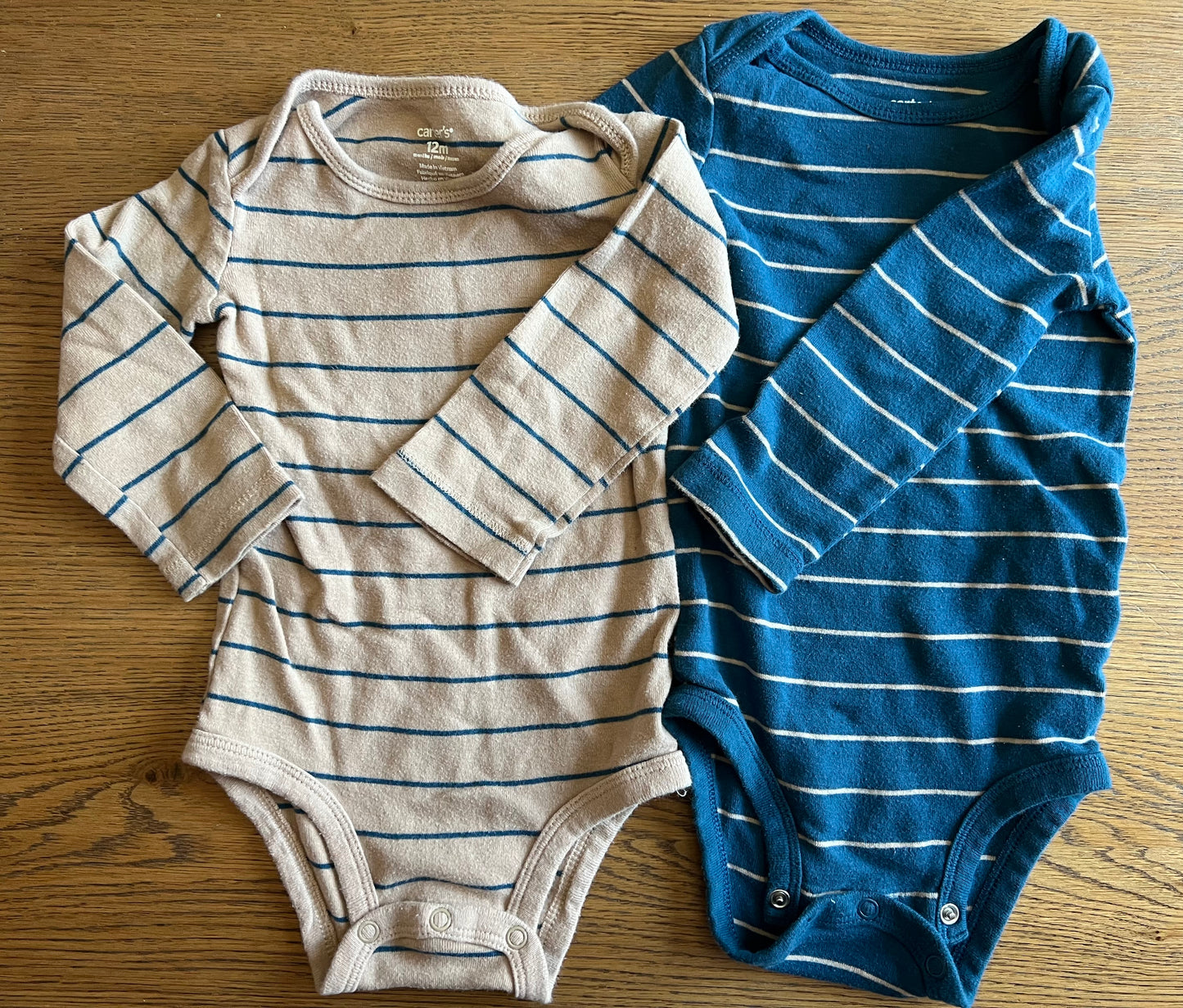 Carter’s 12 months striped long sleeve onesies