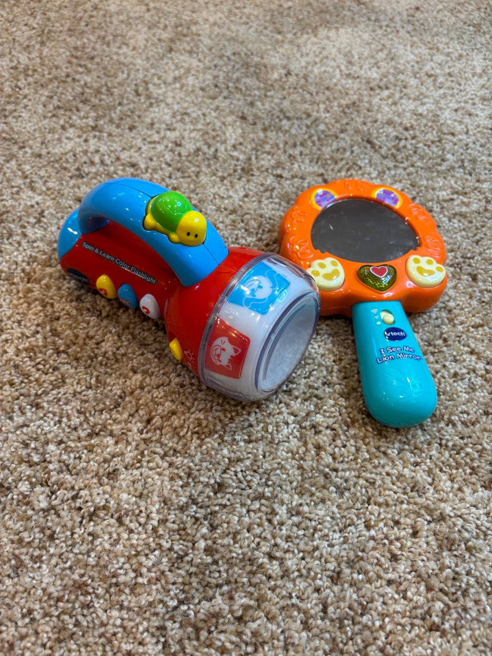 #86A baby toys- flashlight and mirror that lights up and plays music