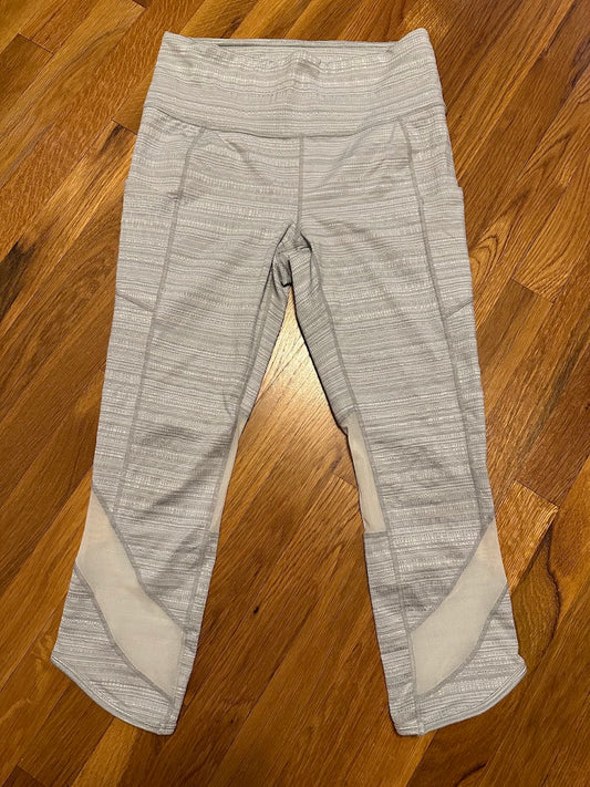 Seller #101 Athleta women's size Medium light gray cropped leggings