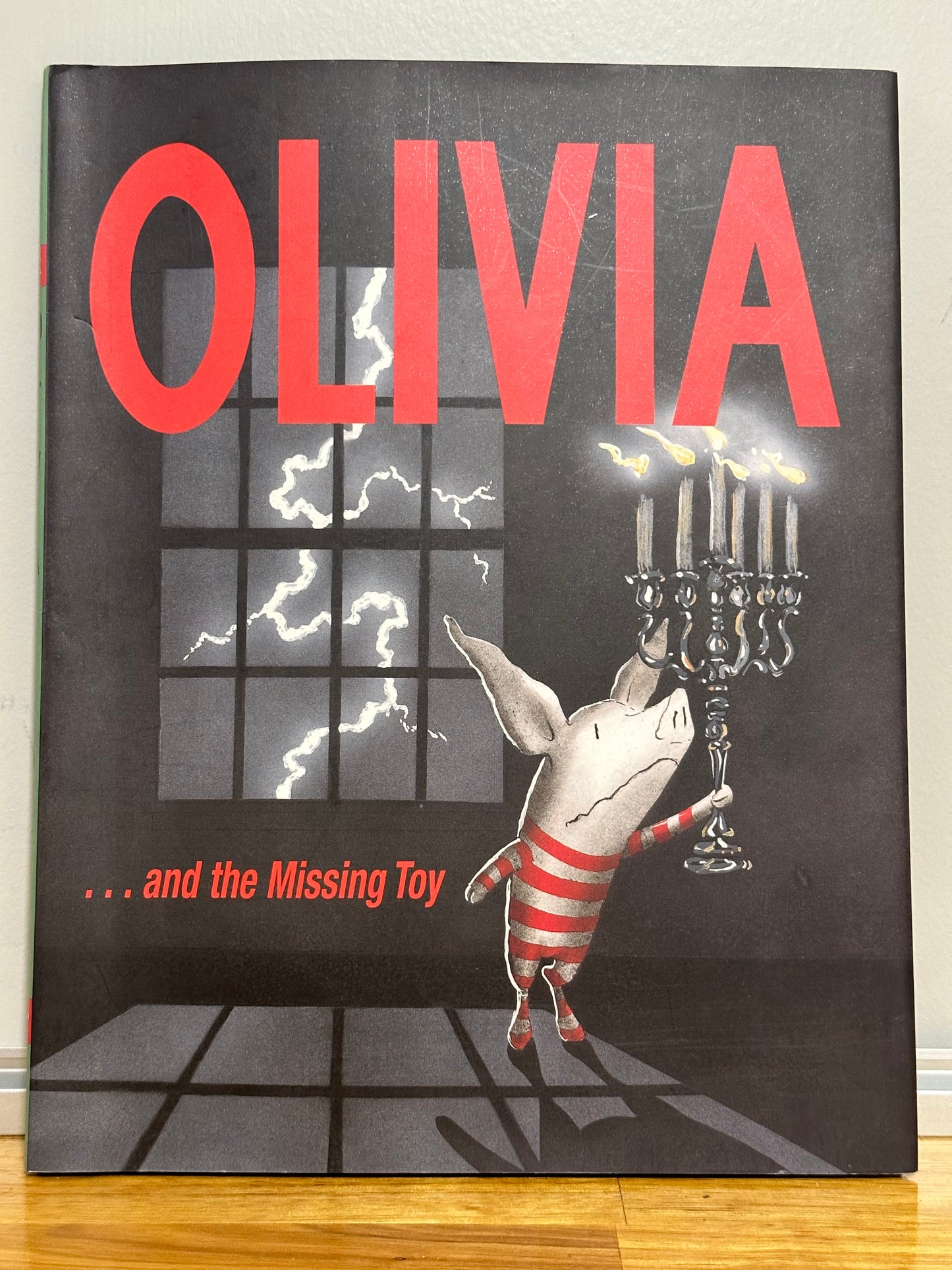 #95A Olivia and the Missing Toy hardcover book EUC