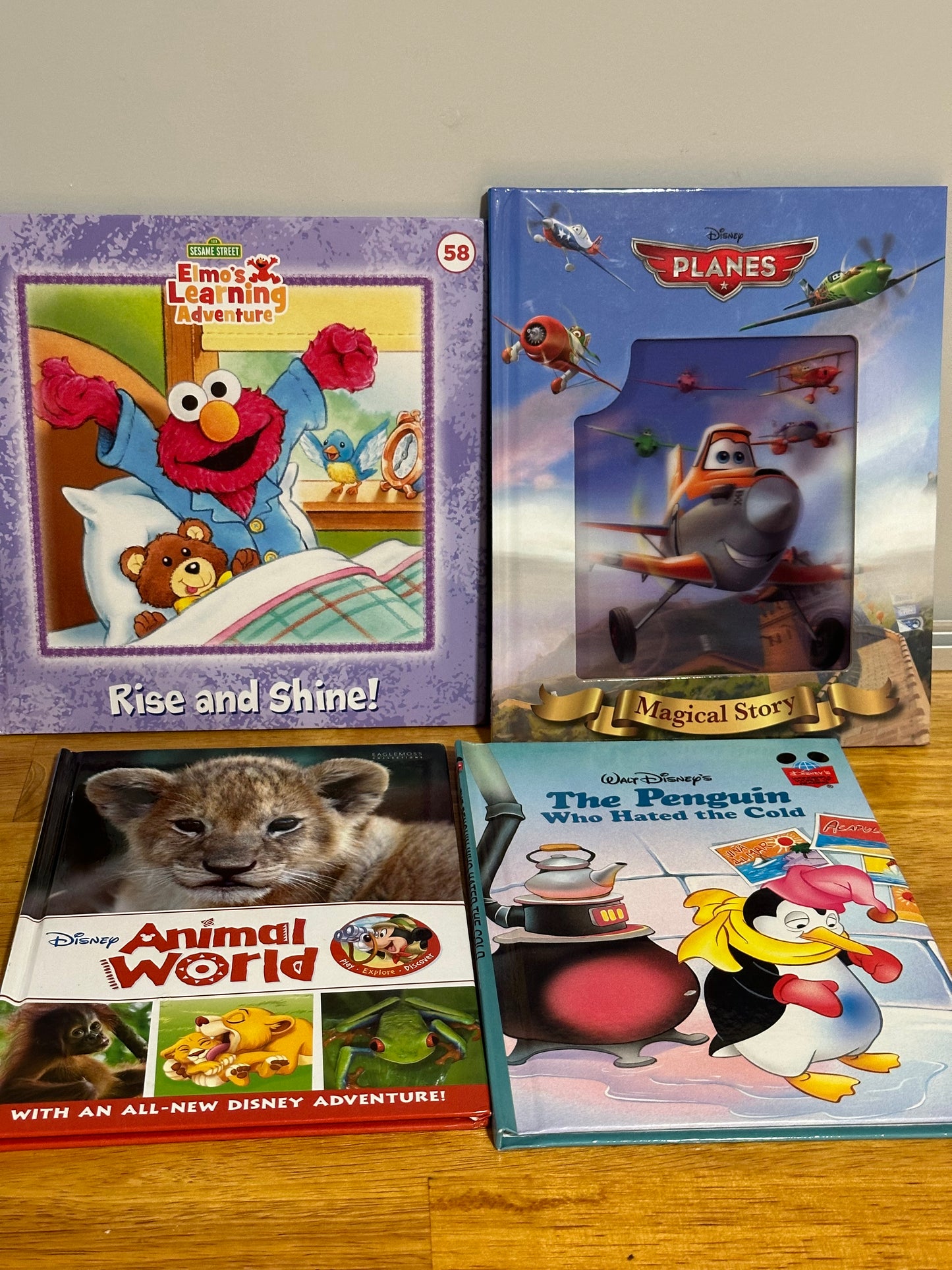 #95A REDUCED 4 Hardcover Books - Disney & Elmo - EUC