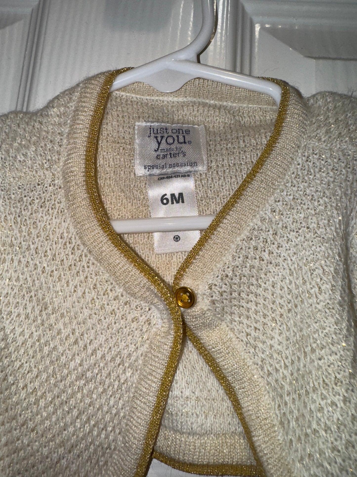 #53 baby girl cardigan from carters size 6M