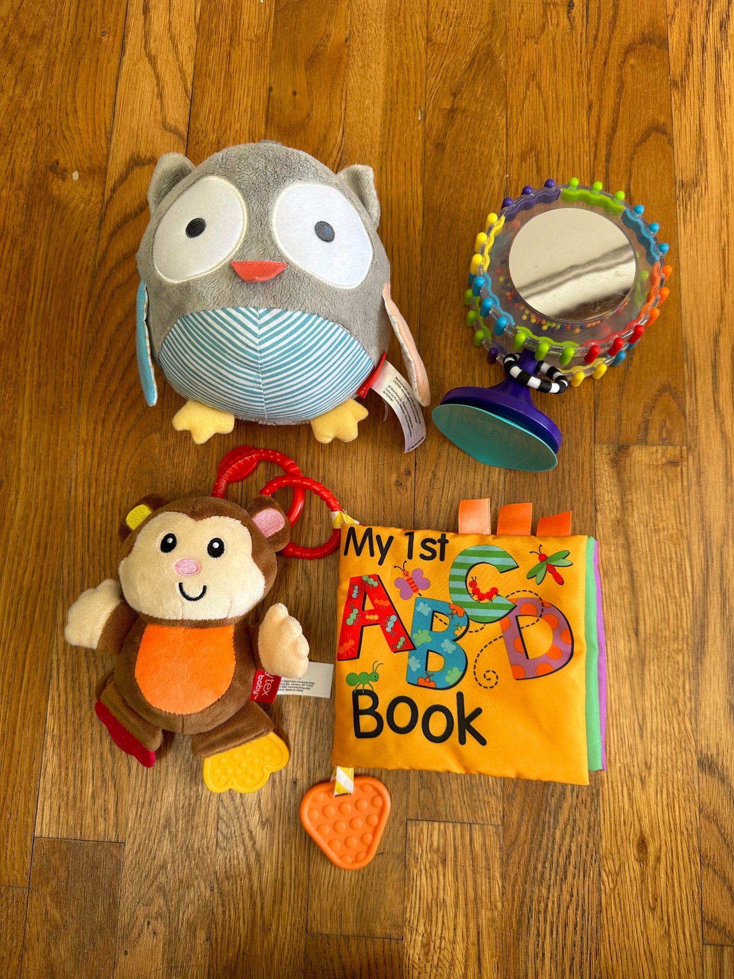 Baby Toy Bundle - Skip Hop Owl Jingle Ball, Rainbow Spin Suction Toy, Soft ABC book + Monkey Toy