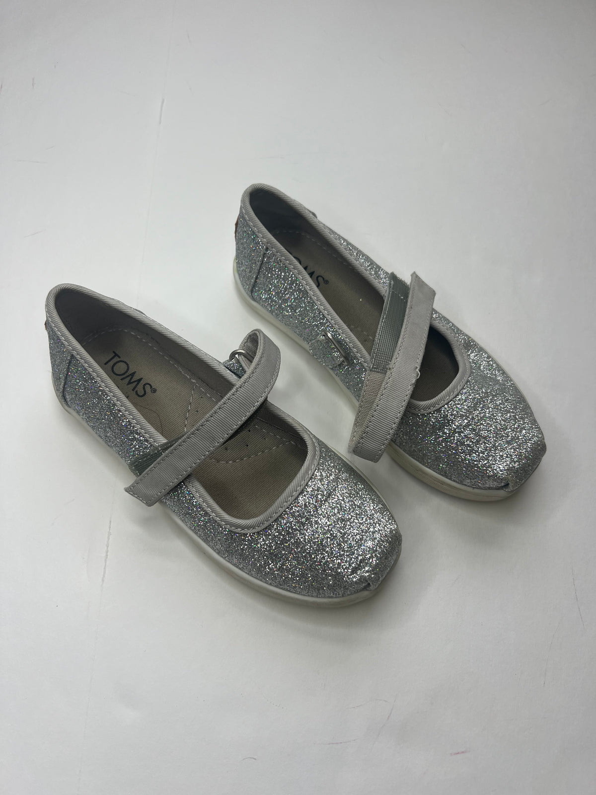 #180 Toms girls size 10c silver sparkle shoes