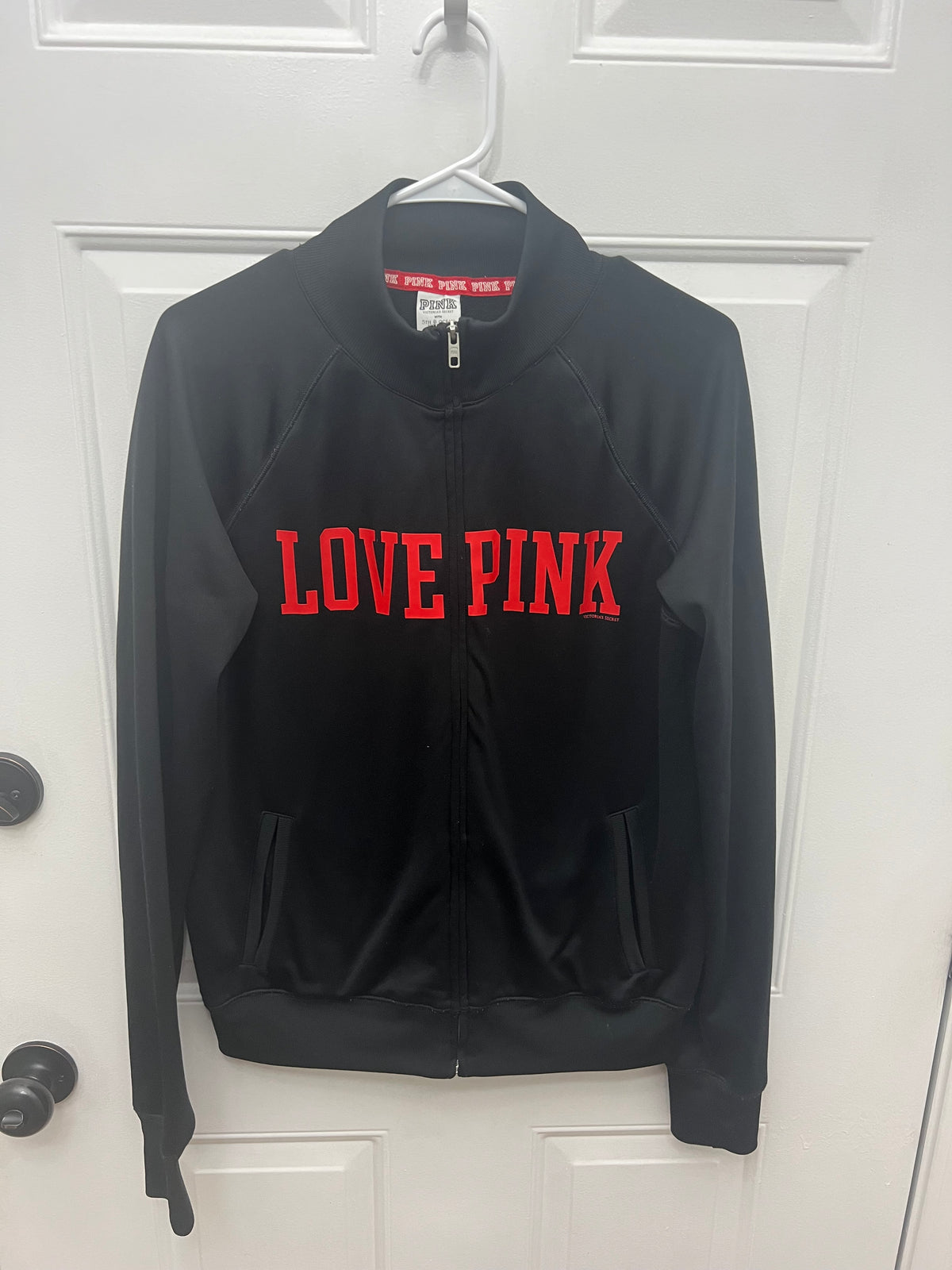 #180 Pink by VS ladies size Large Louisville black zip up jacket