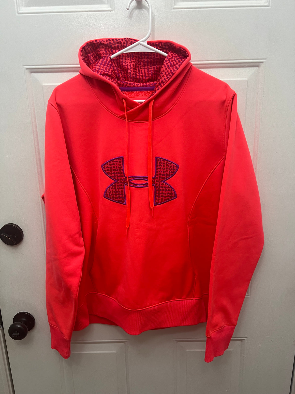 #180 Under Armor Ladies size XL neon pink hoodie