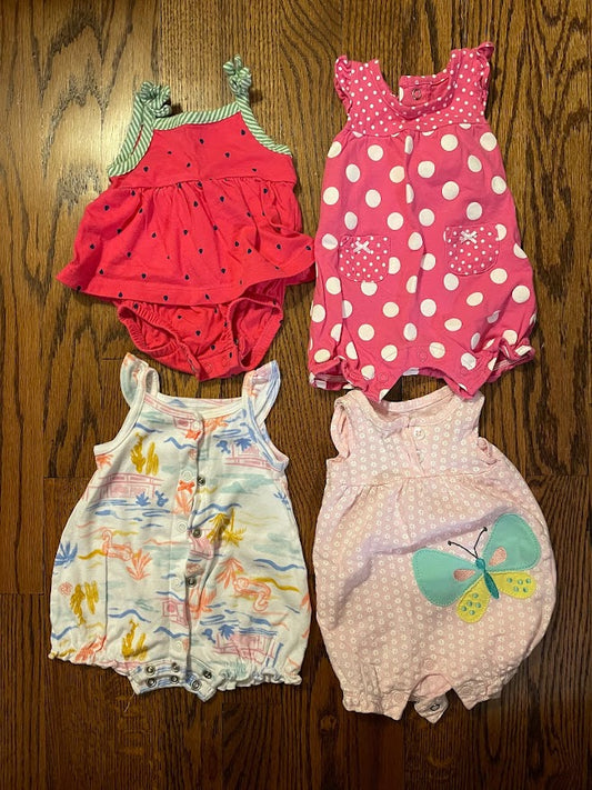 Carters Baby girl size NB bubble bundle. Strawberry, pink polka dot, butterfly, and tropical pattern
