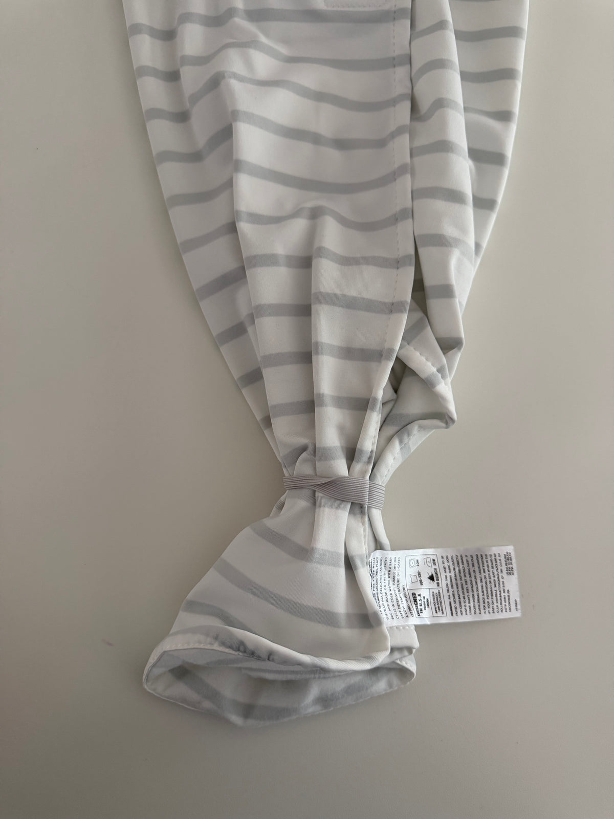 #117, The Ollie Swaddle gray & white striped, EUC