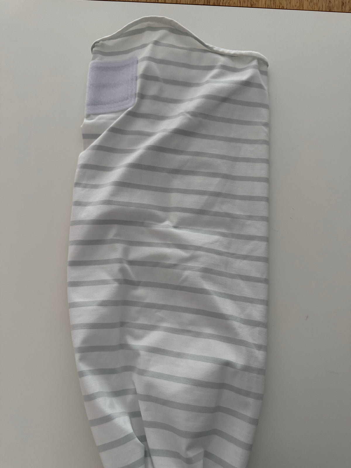 #117, The Ollie Swaddle gray & white striped, EUC