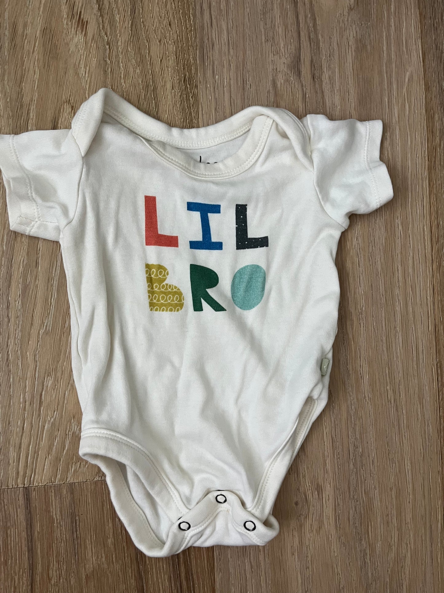 #47 0-3 month “Lil Bro” short sleeve onesie