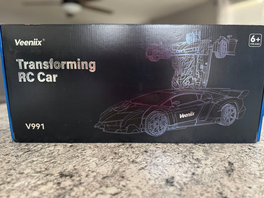#107 Transformer RC Car (new in box)