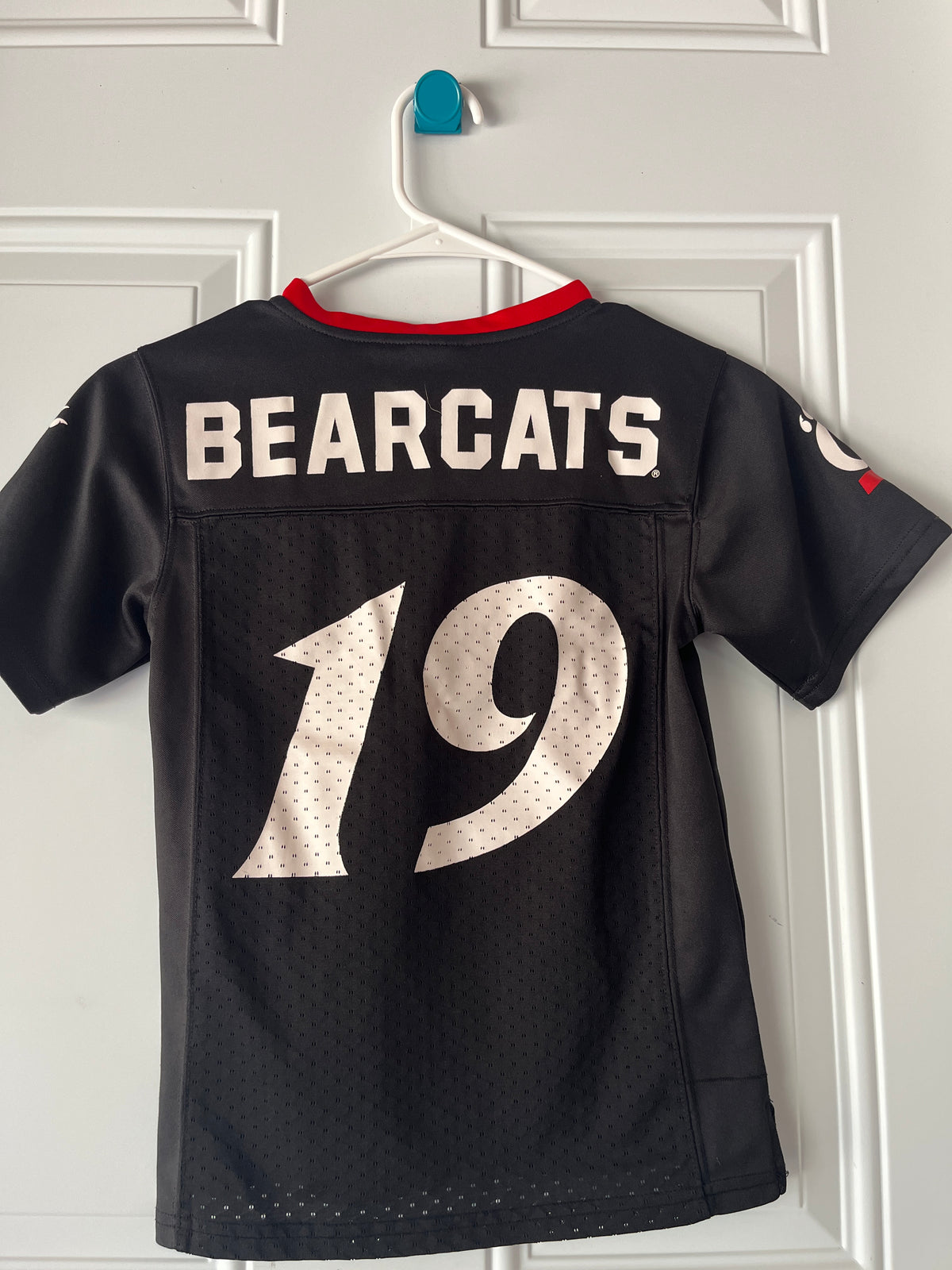 135 UC #19 football jersey Youth XS