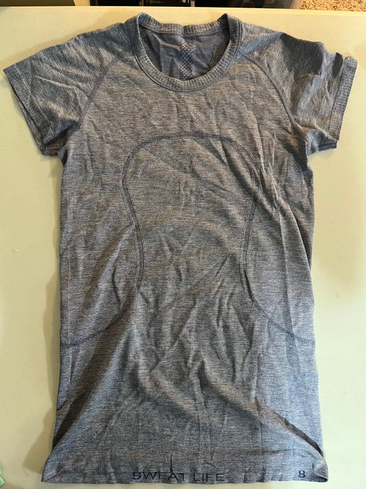 Seller #28 - Women's Size 8 Glittery Blue Swiftly Top - EUC
