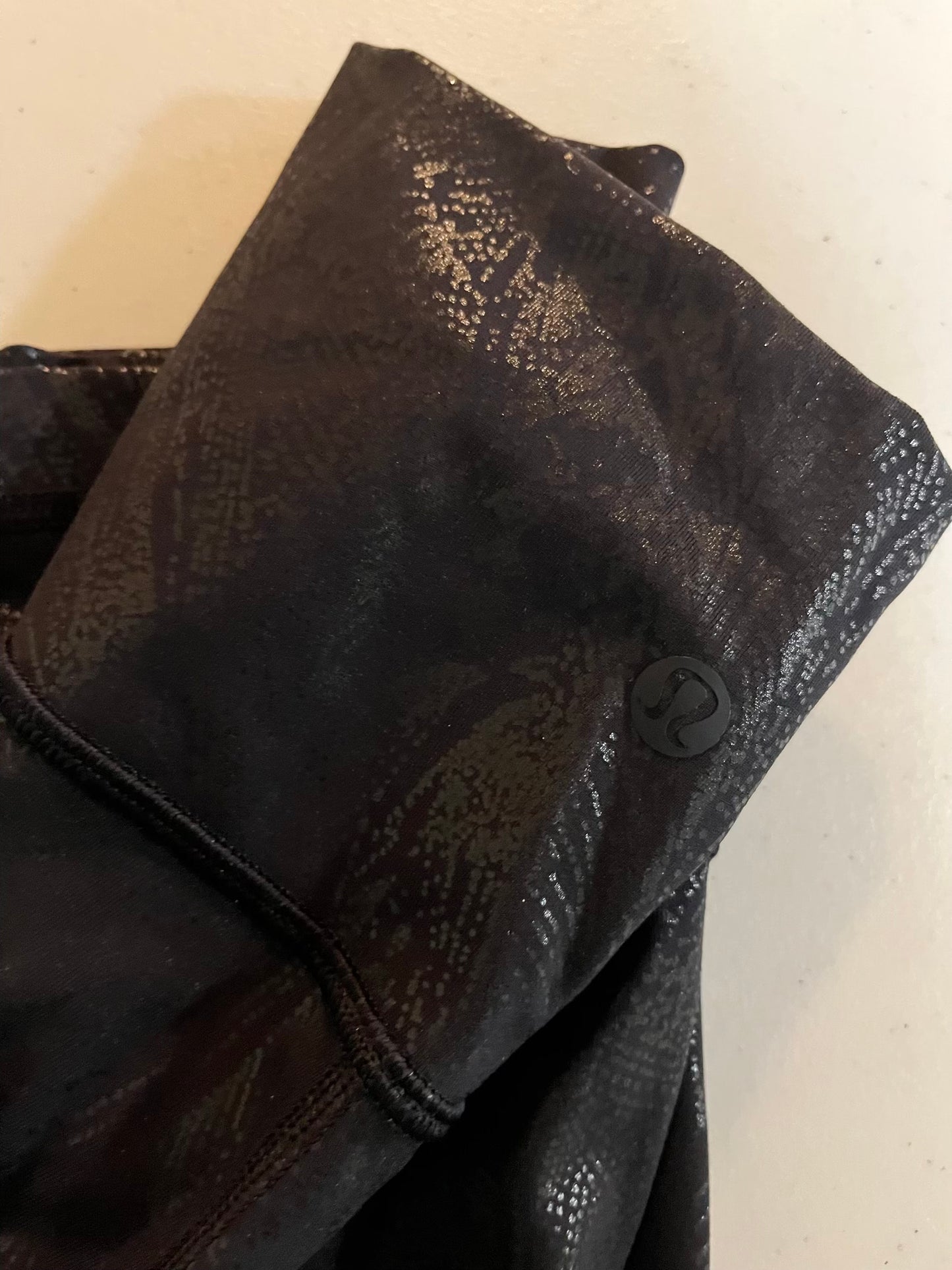 Seller #28 - Women's Size 10 Shiny Black LuluLemon Leggings - EUC
