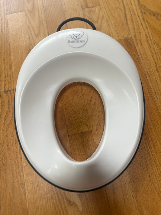 #104 baby Bjorn potty seat, black trim