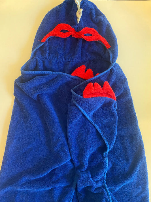 Superman towel with hood and “mittens. Would be perfect for toddler