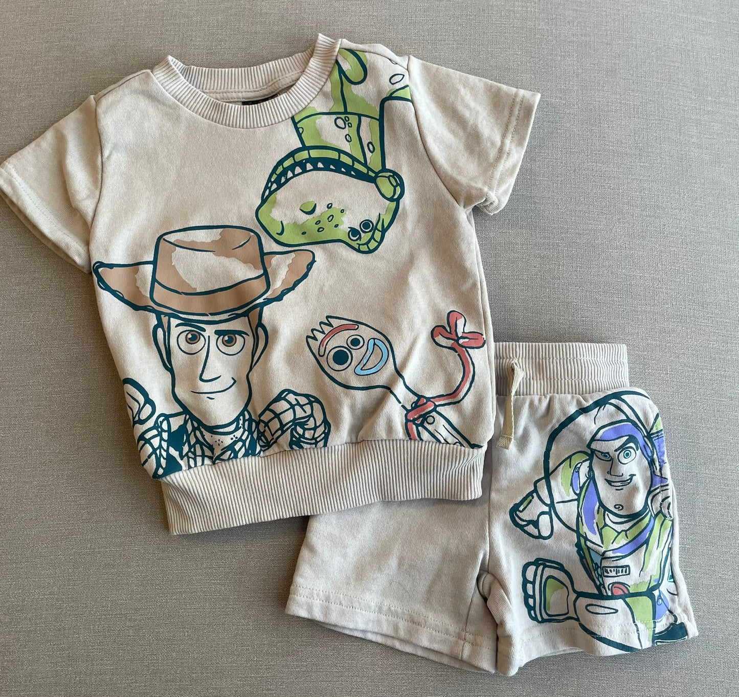Seller #12 | Boys | Disney (Target) Toy Story Multicolor Characters and Tan Background Outfit | Size 2T