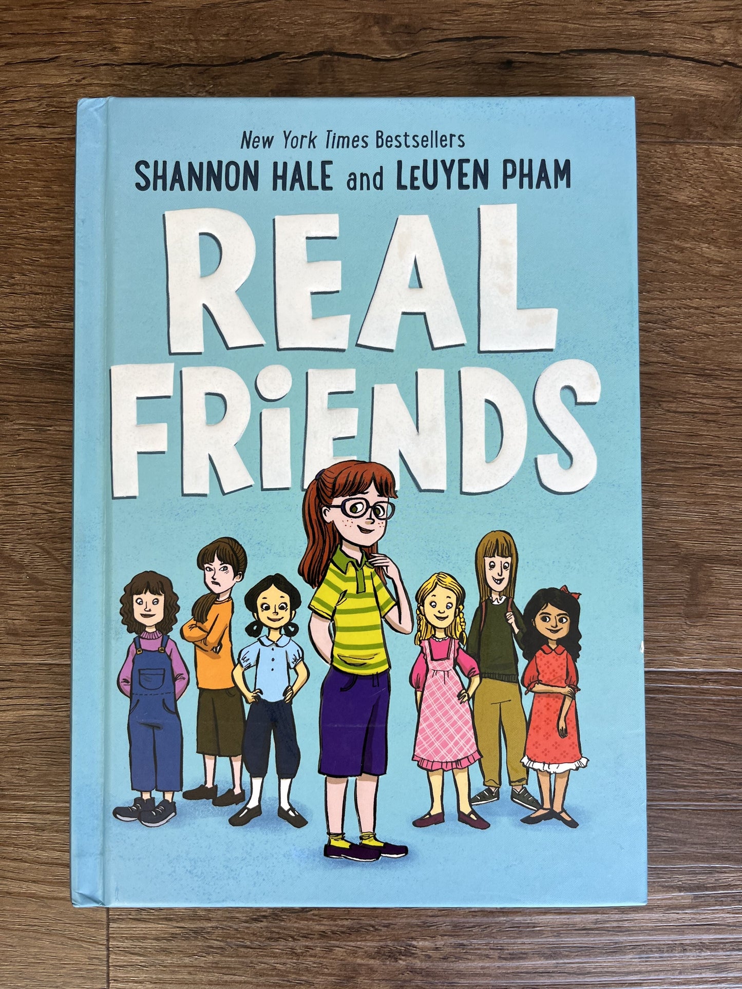 #124 Real Friends Hard Cover Book