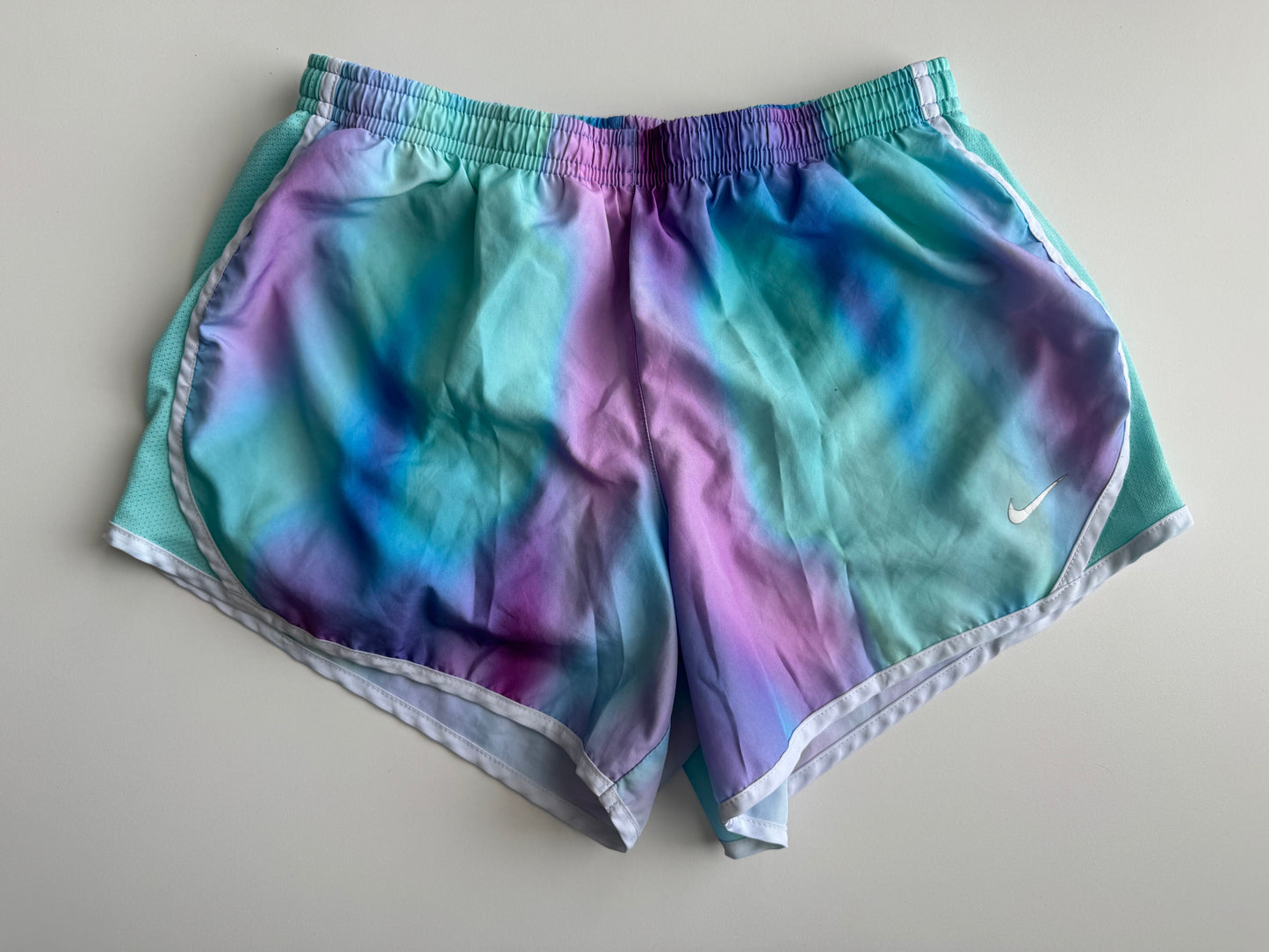 #32 Nike Girl’s L dri fit running shorts, blue tie dye