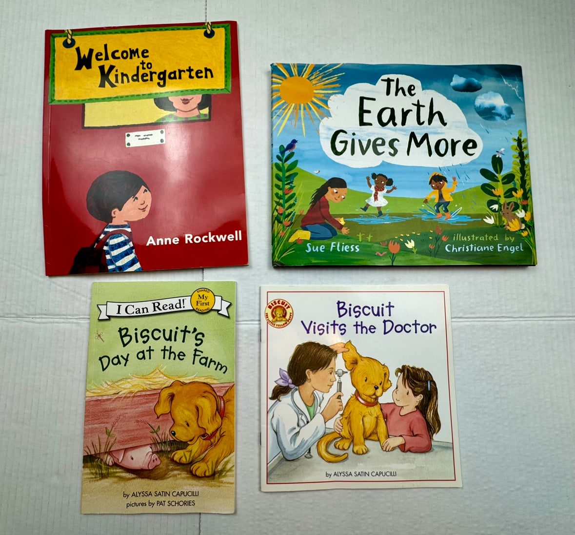 (4) Books: (2) Biscuit Books, Paperback Welcome to Kindergarten & The Earth Gives More Hardback EUC