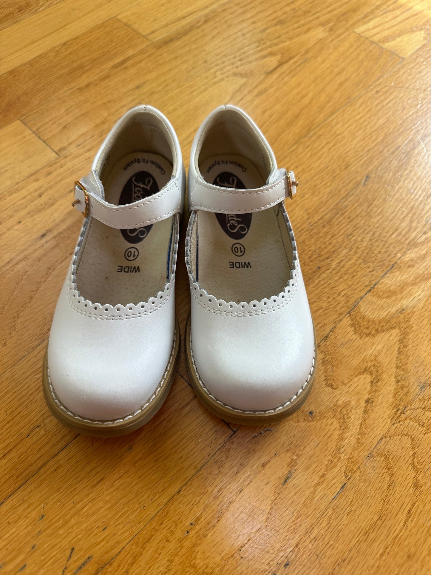 #104 white leather  girl size 10c