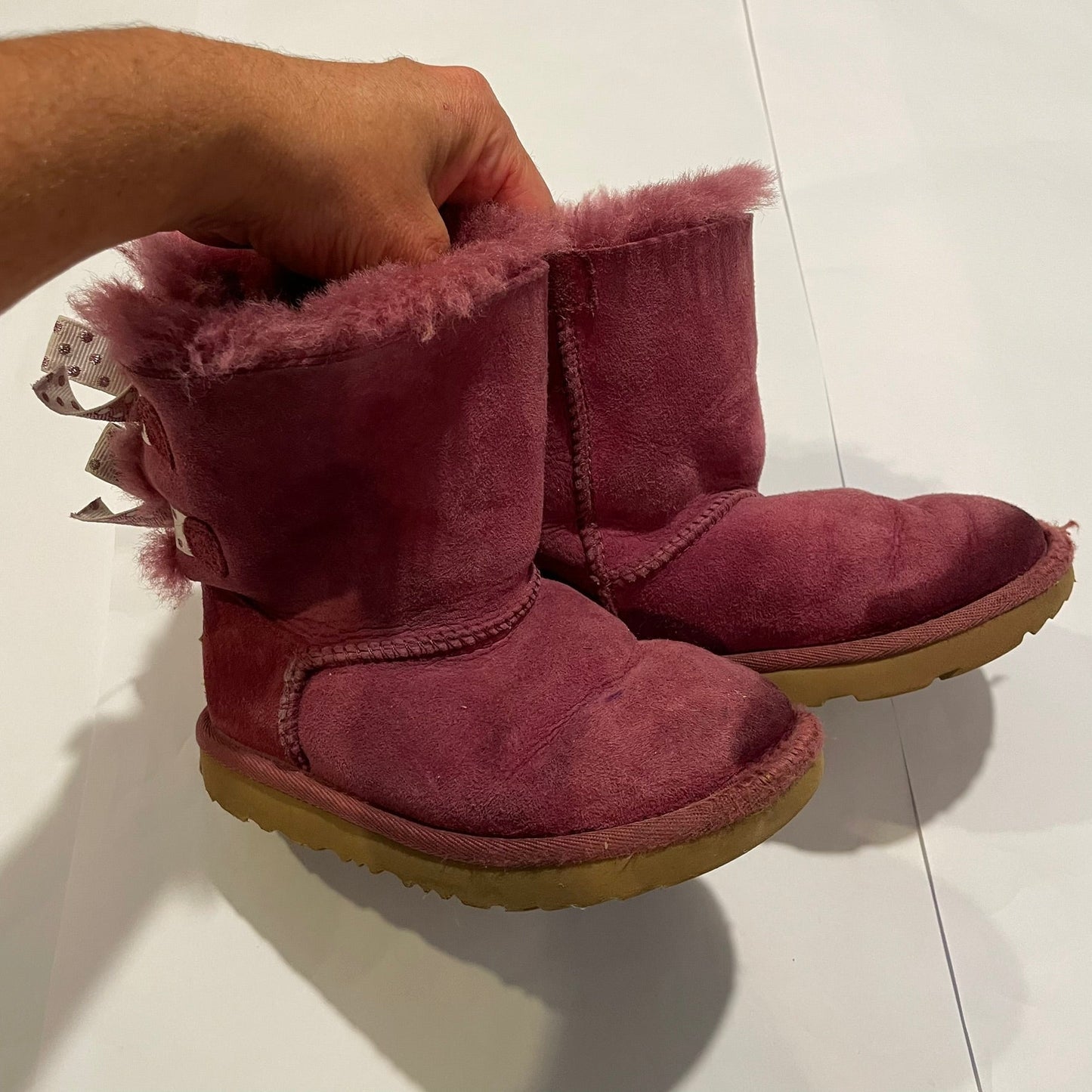 #126 Girls Uggs Sz 12 Dark Pink with bows Play