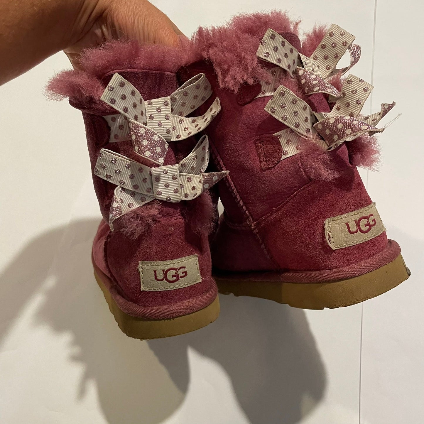 #126 Girls Uggs Sz 12 Dark Pink with bows Play