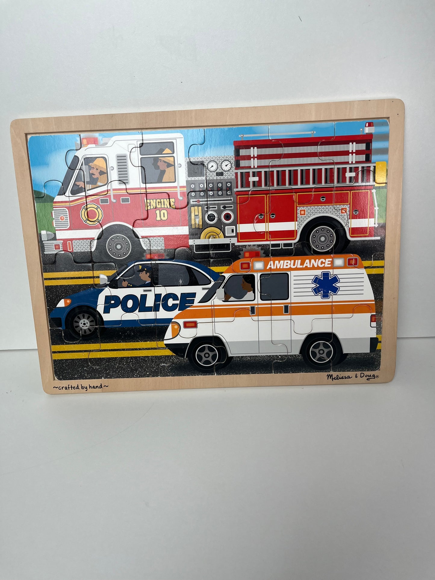 PPU 45241 Melissa and Doug firefighter and policeman wooden jigsaw puzzle