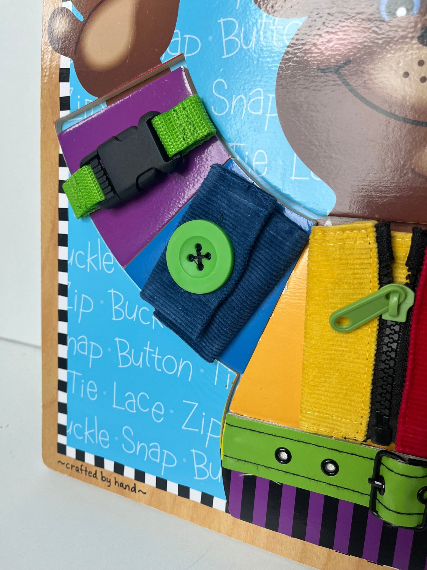 #7 Melissa and Doug basic skills board - fine motor skills