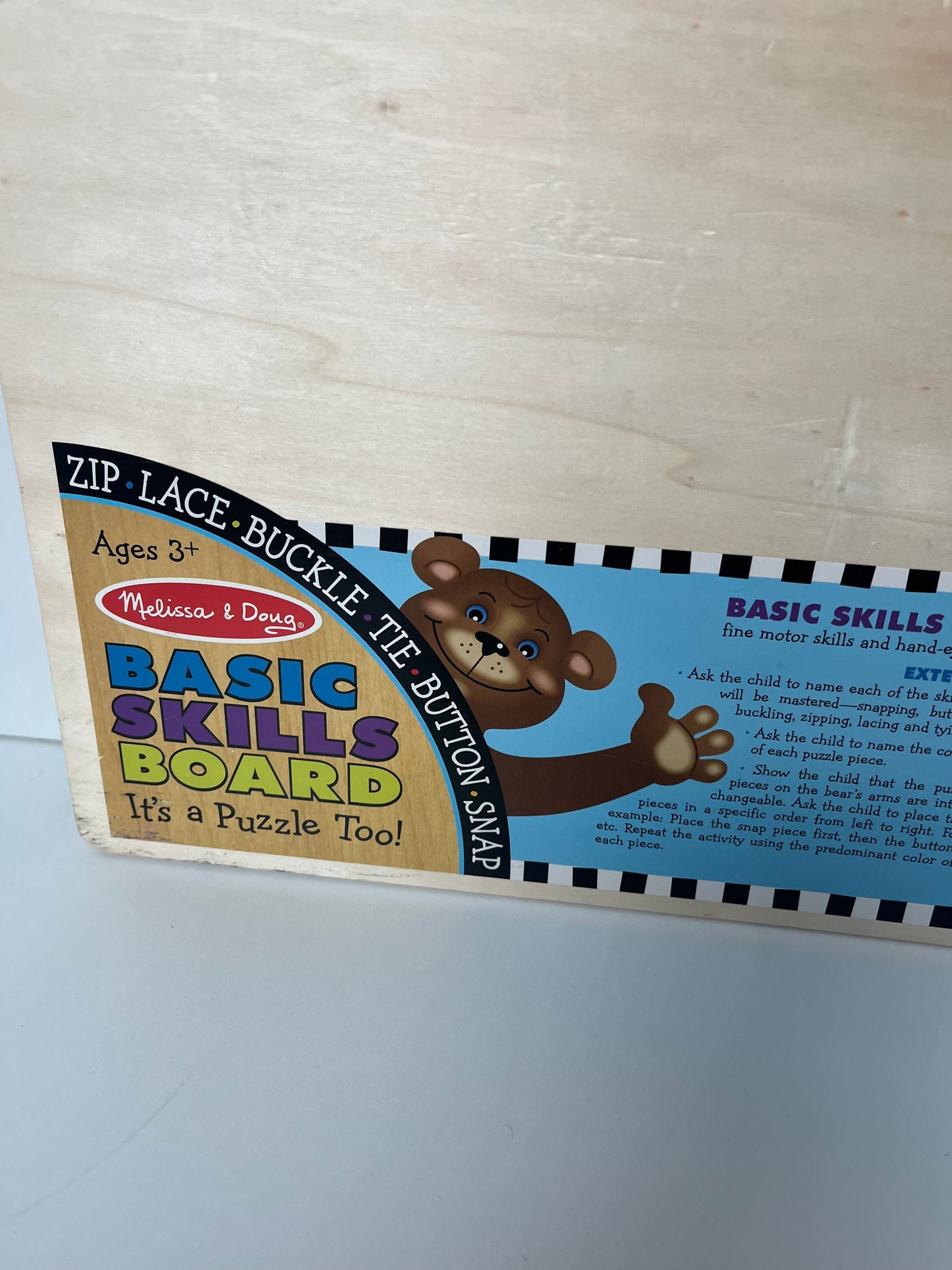 #7 Melissa and Doug basic skills board - fine motor skills