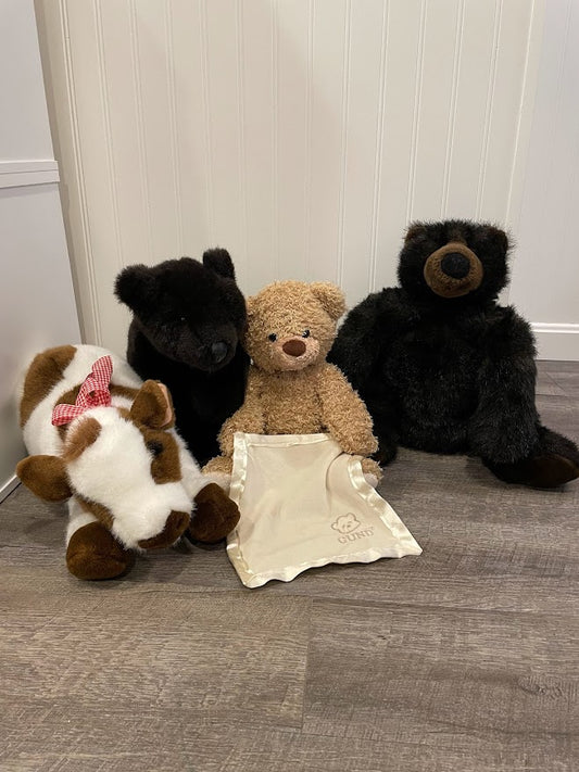 Bear stuffed animals and cow (4 total)