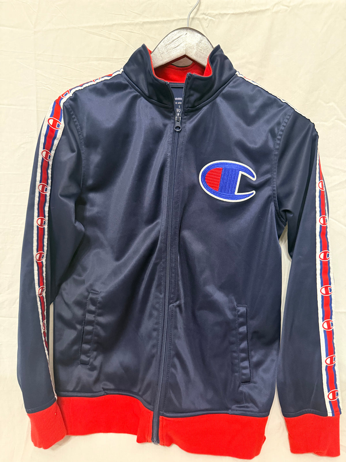 #143 Champion zip up track jacket boys navy & red size large (L)