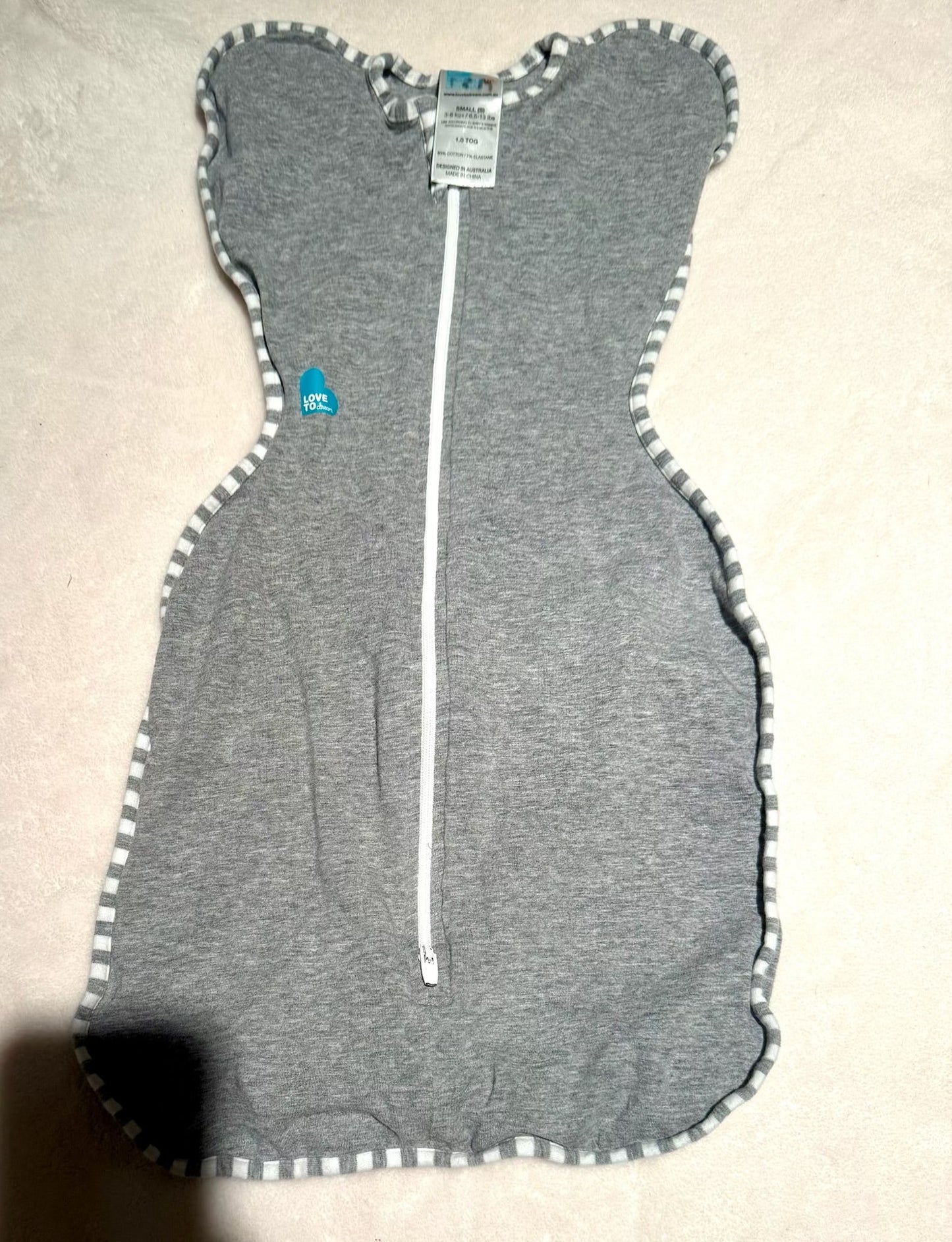 136 EUC small swaddle up sleeper