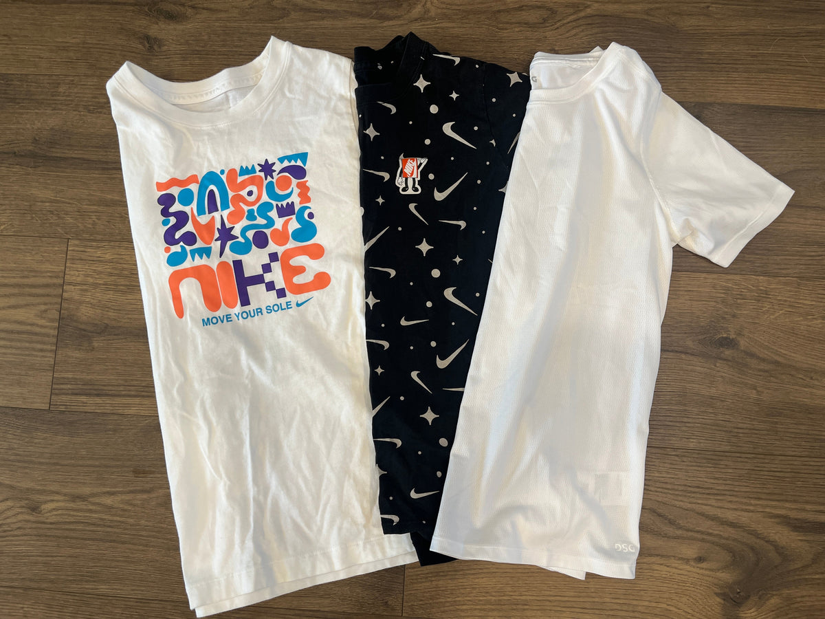 135 Total of 3 shirts boys YM, 2 nike shirts and plain white DSG brand, LN and EUC, no stains