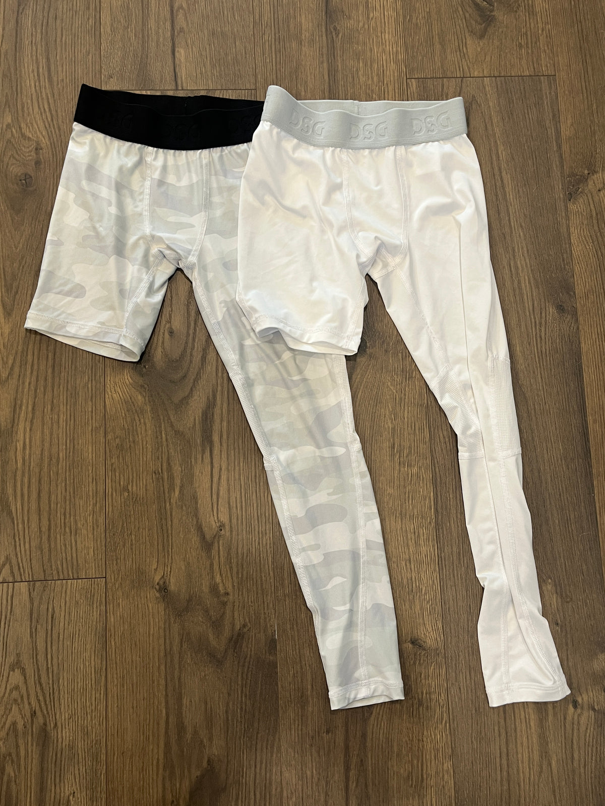 135 DSG brand YM, EUC Basketball tights, Yes they were made with only the L leg being full length.