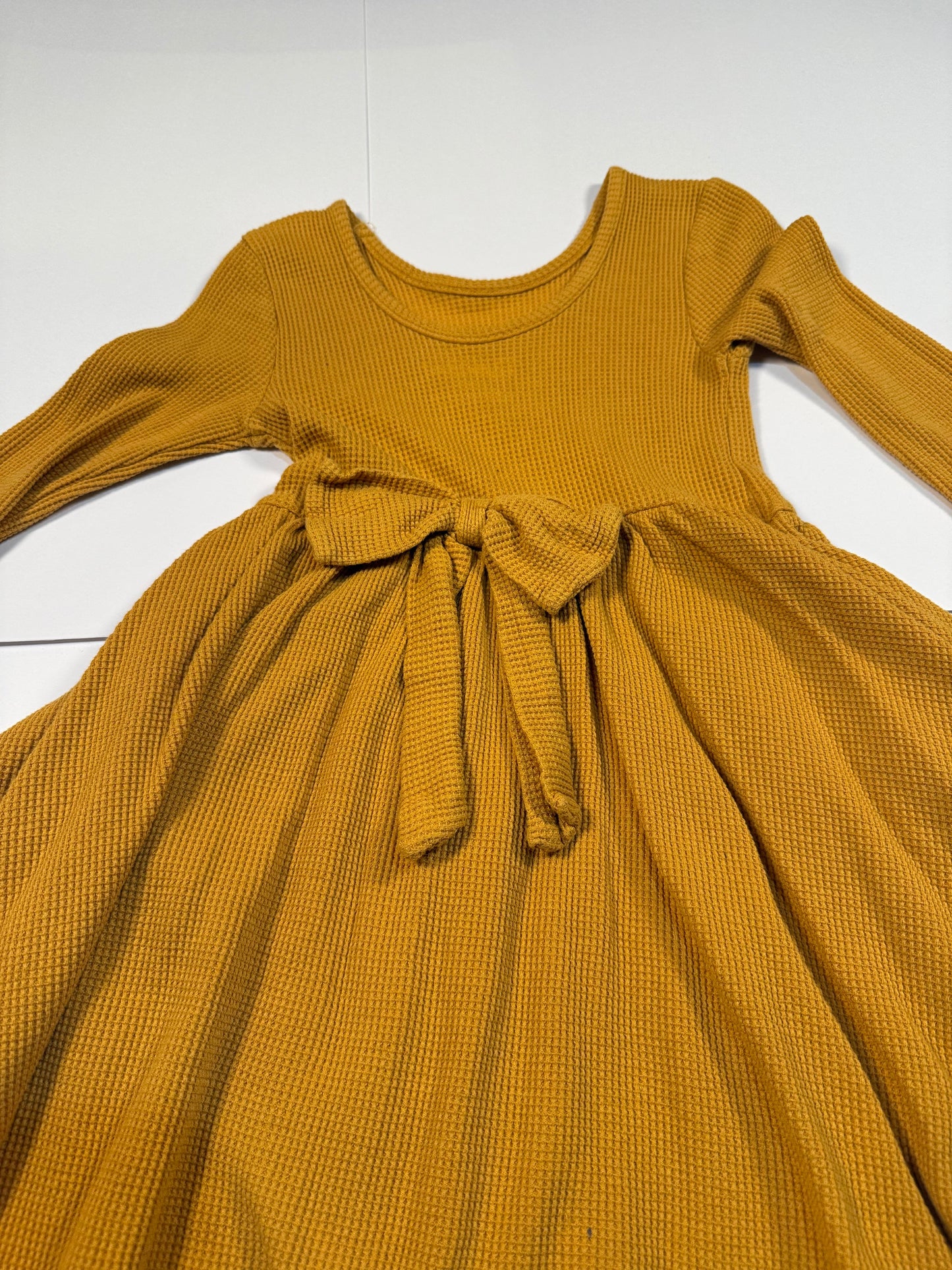 #180 Girls 5 Ruffle Butts Gold Dress with Bow on Back and Pockets