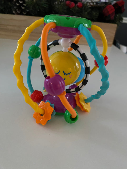 Smiley Face Rattle and Teether multicolor toy