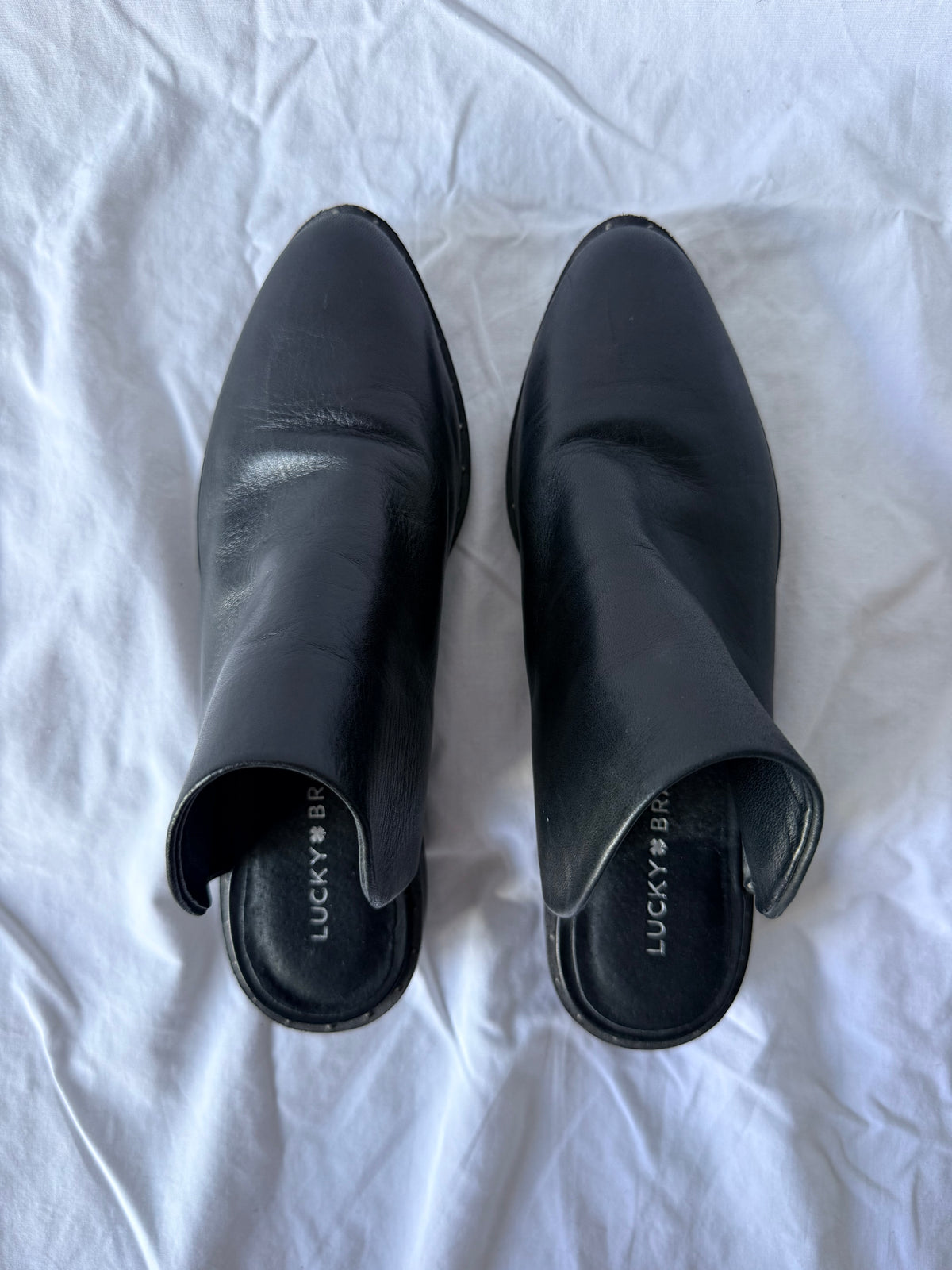 #143 Lucky Brand black leather slip-on mules women’s size 7.5