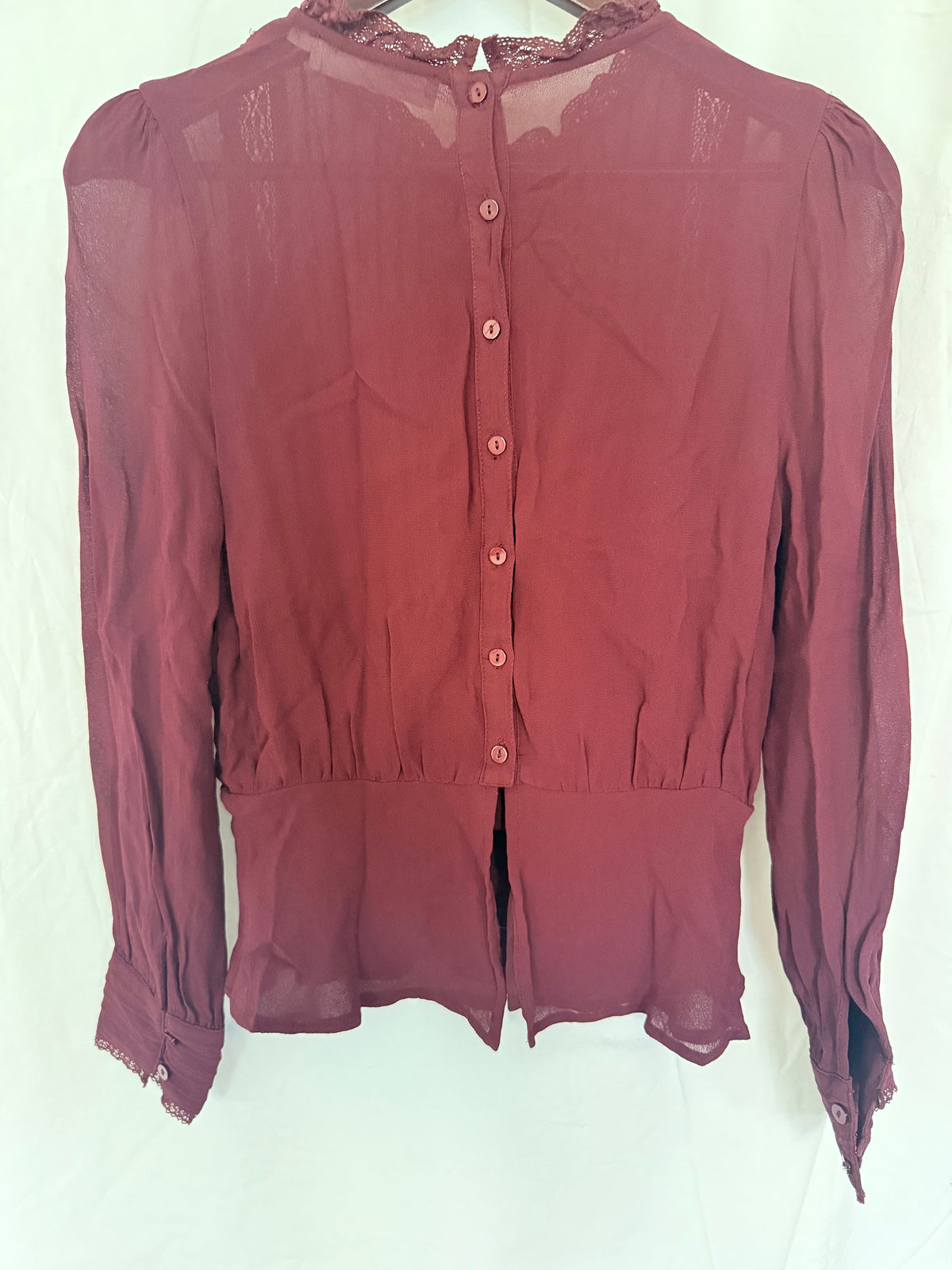 #143 ASTR burgundy button back blouse women’s size S