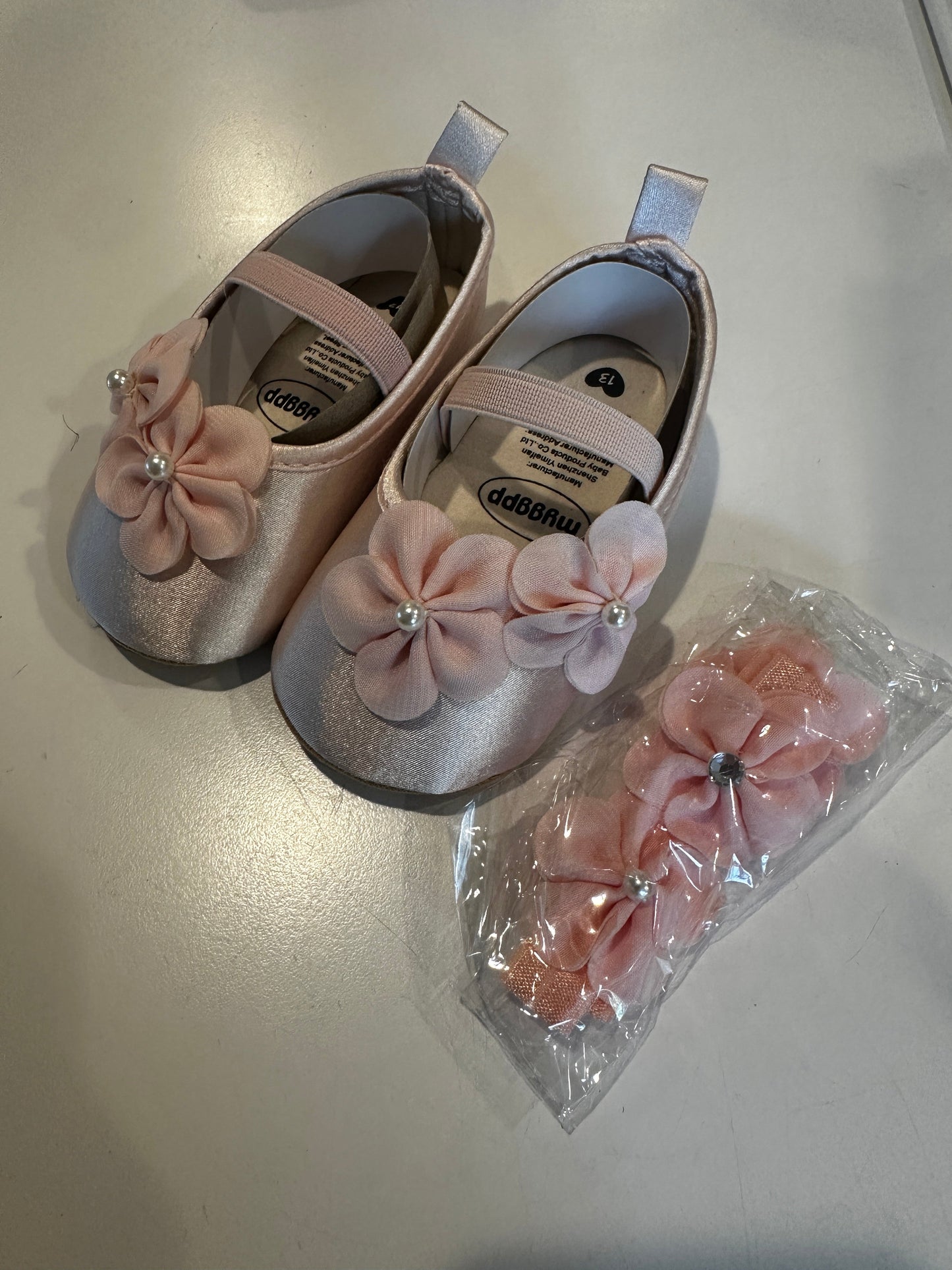 girl's light pink slip-on flat with floral detail size 18-24 month