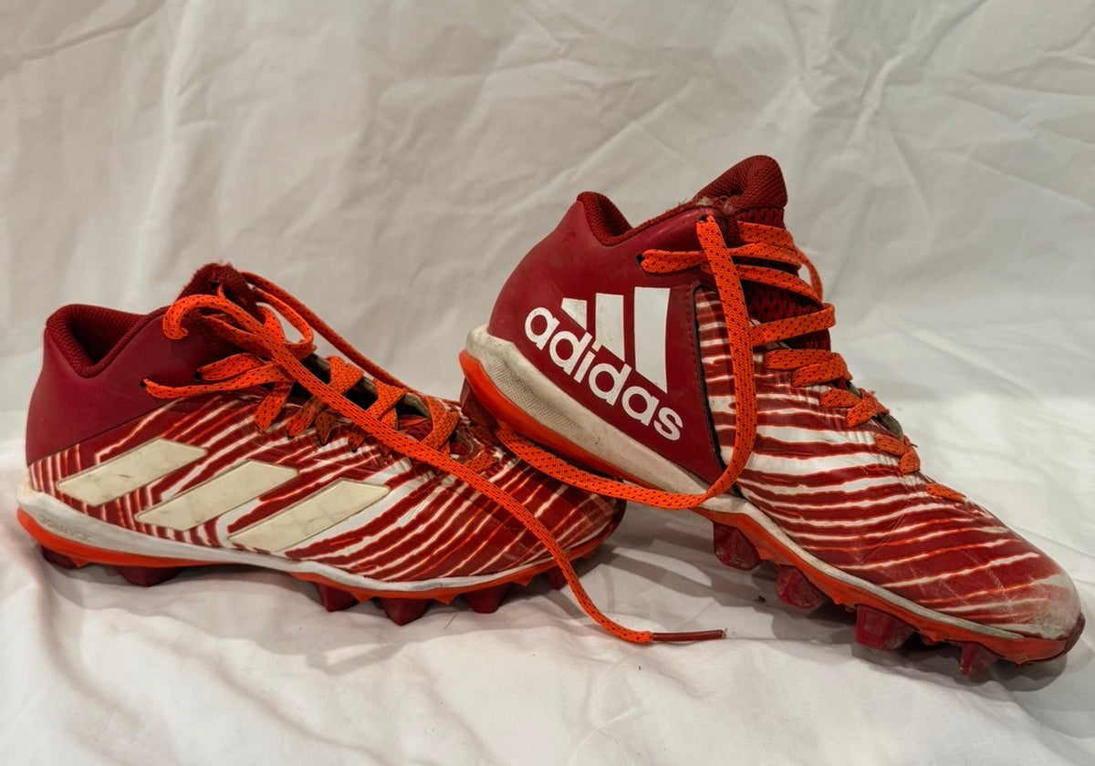 #143 Adidas youth red cleats, size 3