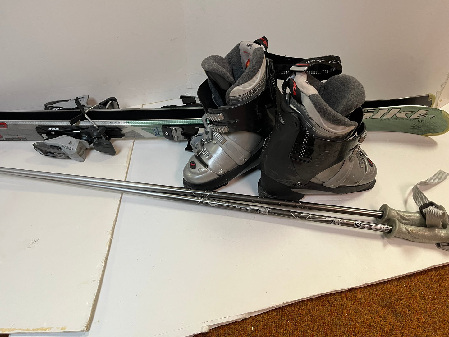 #36 skis, poles, boots sz7