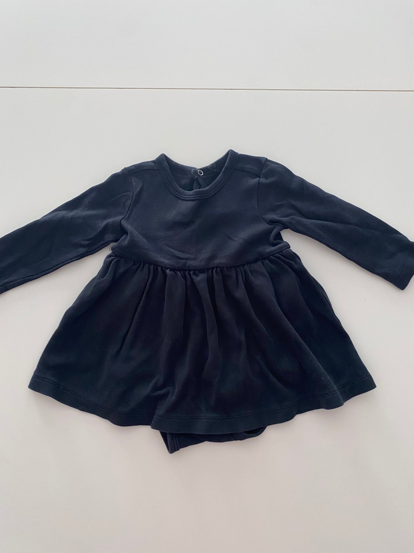#117- Girls 12M, Primary black onesie dress, VGUC,*reduced*